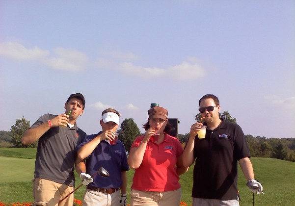 Remy, Carl O. , Susan Saunders (me), Mason (Circa 2009 when golf was still fun to me)