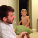 A Dad Takes Down His Toddler in a Pillow Fight [VIDEO]